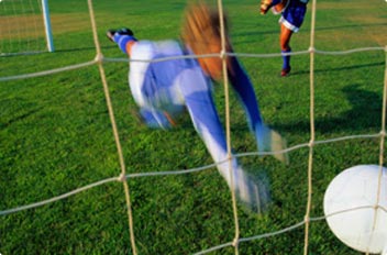 A photo of a goalkeeper with “subject motion” blurring